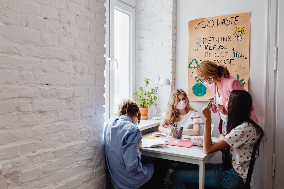 A teacher instructs teenagers on environmental conservation in a classroom setting, emphasizing zero waste practices.